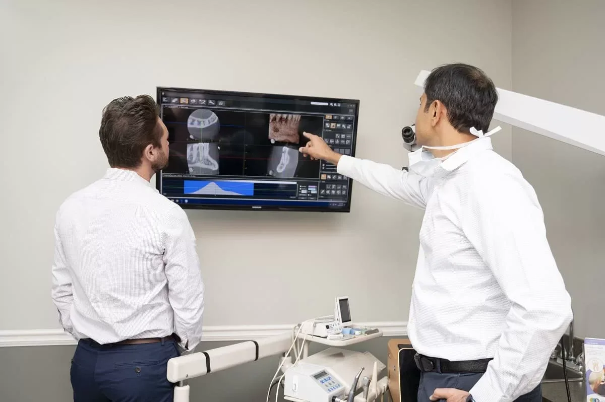 Doctors reviewing CBCT 3-D imaging at Endodontic Associates of Atlanta